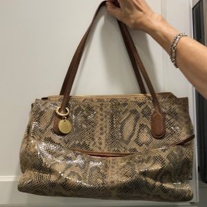 I love Hobo genuine leather faux skin bag